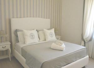 A bed or beds in a room at B&B Pompei Passion