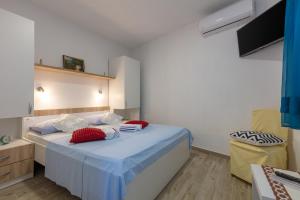 Ένα ή περισσότερα κρεβάτια σε δωμάτιο στο Holiday Home Vesna