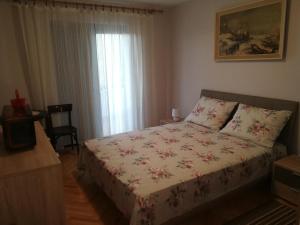 Postel nebo postele na pokoji v ubytování Apartman Buble