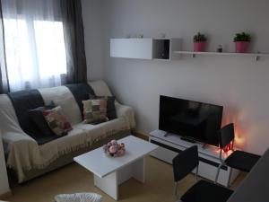 A seating area at Apartment 316 Condado De Alhama