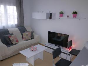 A seating area at Apartment 316 Condado De Alhama