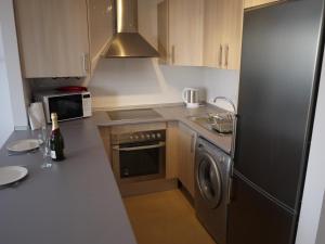A kitchen or kitchenette at Apartment 316 Condado De Alhama