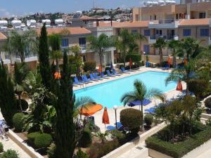 a view of the pool at the hotel at Aurora Townhouse - Complimentary Paphos Airport Transport in Paphos City