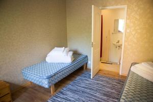 Cama o camas de una habitación en Rannapargi Housing