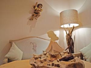 Postelja oz. postelje v sobi nastanitve Hotel Garni Apart TINA