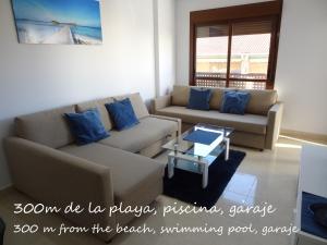 A seating area at Apartament Lazurowy