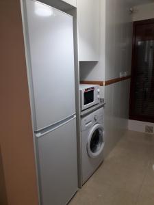 A kitchen or kitchenette at Apartament Lazurowy