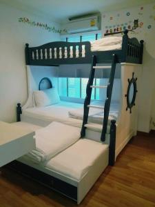 Postel nebo postele na pokoji v ubytování My Resort Huahin C605 + 37 fotografií