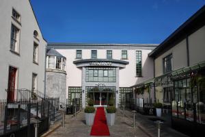 a red carpet in front of a building at Oriel House Hotel in Cork