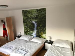 Postel nebo postele na pokoji v ubytování Apartmány Viktorka