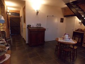 Kuchyň nebo kuchyňský kout v ubytování B&B De Linde