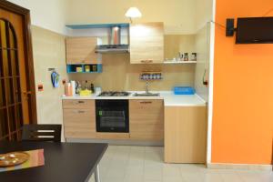 A kitchen or kitchenette at Casa Vacanze Laura