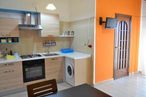 A kitchen or kitchenette at Casa Vacanze Laura