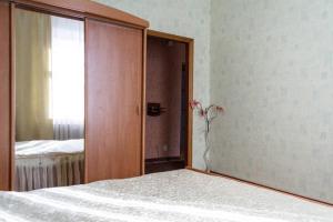 Postel nebo postele na pokoji v ubytování Apartments on Bolshaya Morskaya 65