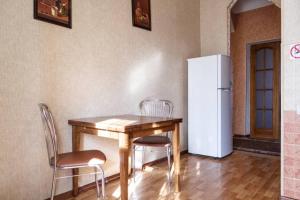 Kuchyň nebo kuchyňský kout v ubytování Apartments on Bolshaya Morskaya 65