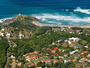 a town with a red circle in front of the ocean at Se-Ayr BnB at Lighthouse in Port Macquarie