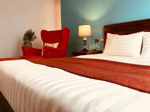 Łóżko lub łóżka w pokoju w obiekcie Kenting Cozy B&B
