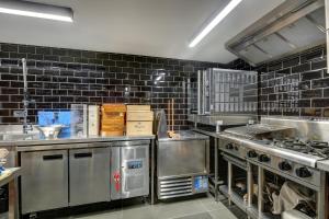 Cuisine ou kitchenette dans l'établissement Luxe Haus