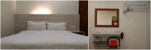 Postel nebo postele na pokoji v ubytování Tambun Inn Hotel