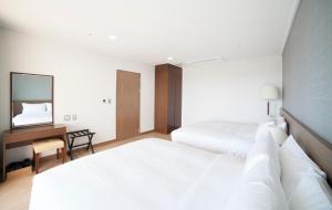 Giường trong phòng chung tại Dongwon Youthhostel
