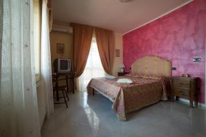 Ένα ή περισσότερα κρεβάτια σε δωμάτιο στο Agriturismo Consalvi Valentina