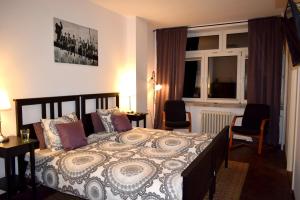 Posteľ alebo postele v izbe v ubytovaní Fiesta Apartament