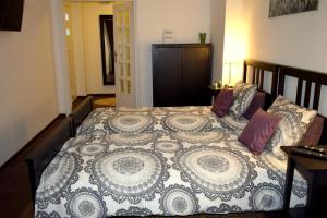 Posteľ alebo postele v izbe v ubytovaní Fiesta Apartament