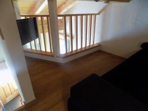 Televízia a/alebo spoločenská miestnosť v ubytovaní Appartements Obergollerhof