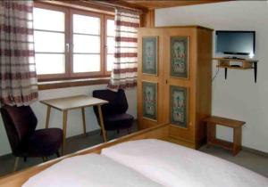 Voodi või voodid majutusasutuse Gasthof Bergheimat toas