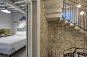 Postel nebo postele na pokoji v ubytování Hotel Torino