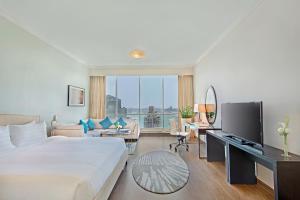 Uma cama ou camas num quarto em Ezdan Hotel Doha