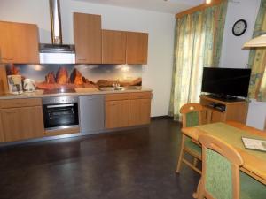 Kuchyňa alebo kuchynka v ubytovaní Appartements Obergollerhof