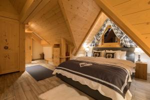 Łóżko lub łóżka w pokoju w obiekcie Aparthotel Bambi