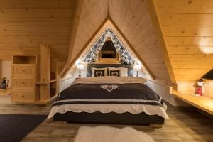 Łóżko lub łóżka w pokoju w obiekcie Aparthotel Bambi