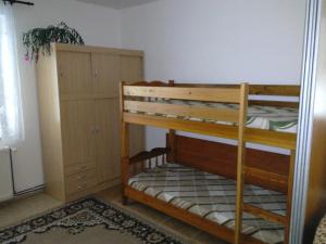 Postel nebo postele na pokoji v ubytování Apartmány pod Suchým Vrchem
