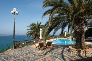 The swimming pool at or close to Studio Thea - Roxan Residence