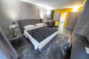 Voodi või voodid majutusasutuse Hotel Spinale toas
