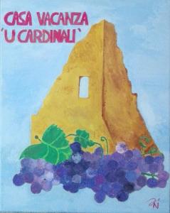 een schilderij van een bos druiven naast een gebouw bij Casa vacanza "U cardinali" in Pachino