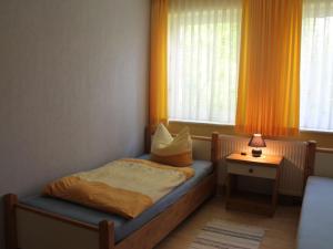 Postel nebo postele na pokoji v ubytování Family Apartment on Rügen