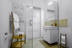 Et badeværelse på Aparthotel Platinum