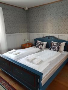 
Säng eller sängar i ett rum på Sonfjällsgårdens Wärdshus & Hotell
