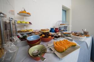 サン・ヴィート・ロ・カーポにあるA Casa Di... Aurora 2の食べ物の盛り付けテーブル +22枚の写真