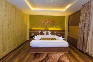 Letto o letti in una camera di Bodhi Boutique Hotel