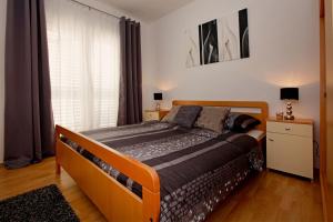Postel nebo postele na pokoji v ubytování House Ivan