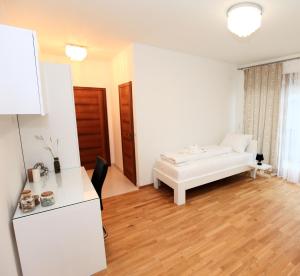 Letto o letti in una camera di Gästezimmer Hurem