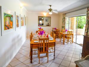 a dining room with a table and chairs at Sundune Guest House in Colchester