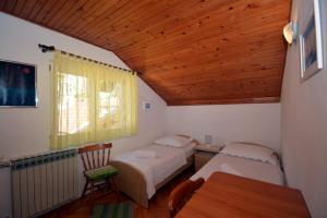 Postel nebo postele na pokoji v ubytování Aparment Mimica-Croatia , Omis , center