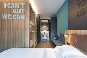 Ein Bett oder Betten in einem Zimmer der Unterkunft HUP