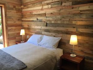 Postel nebo postele na pokoji v ubytování Hotel 381 Panguipulli