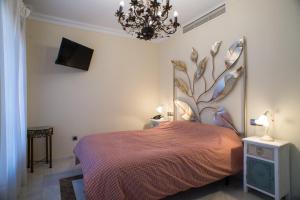 Łóżko lub łóżka w pokoju w obiekcie Hotel Coral Playa